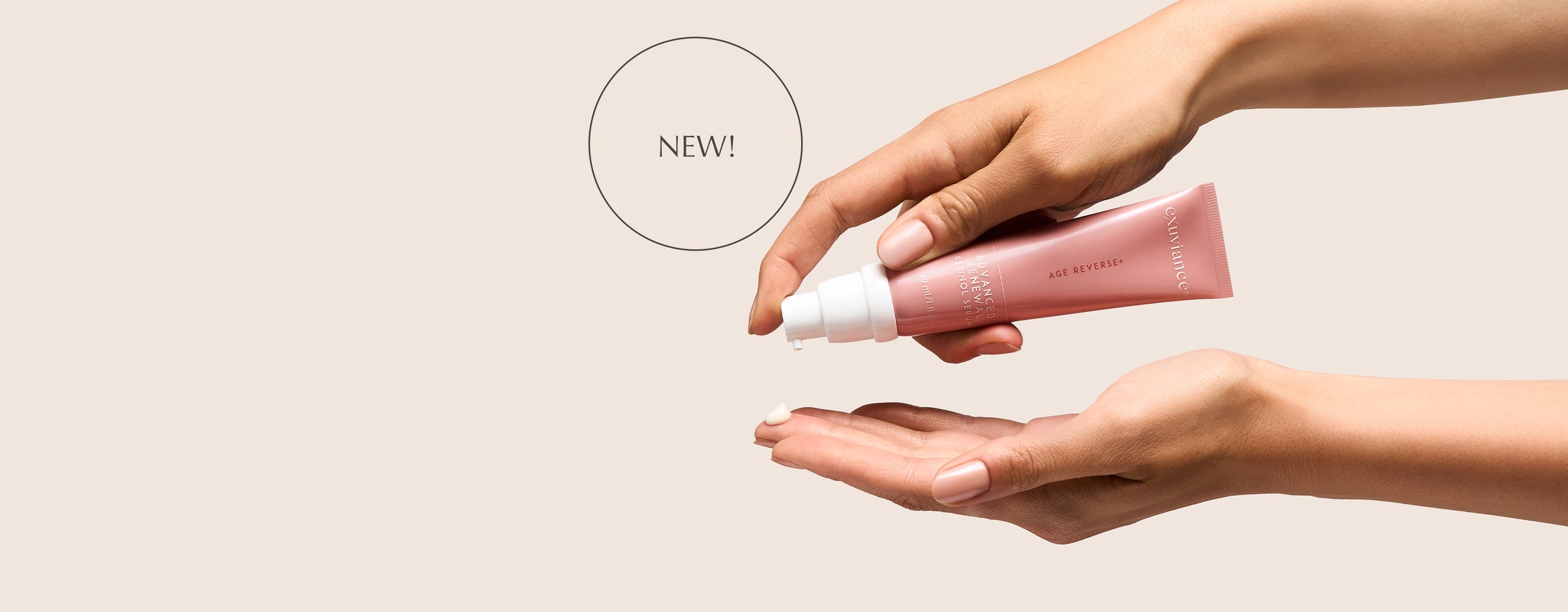 Pair of hands holding Exuviance Advanced Renewal Retinol against a beige background.
